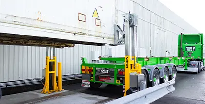 Container positioned in a constrained site